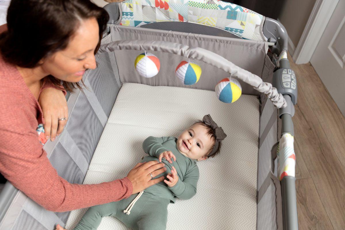 Contour® Electra Bassinet Travel Cot With Changing Table